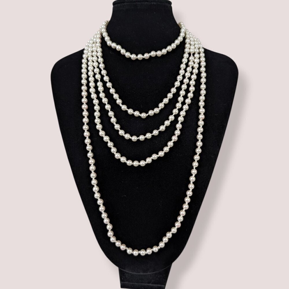 V. Extra Long White Faux Pearl Infinity Necklace